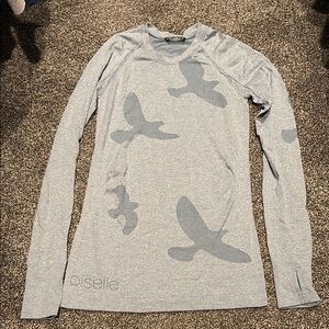 Oiselle light blue long sleeve fly top